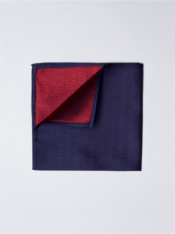 Navy blue pocket square with red micro dots