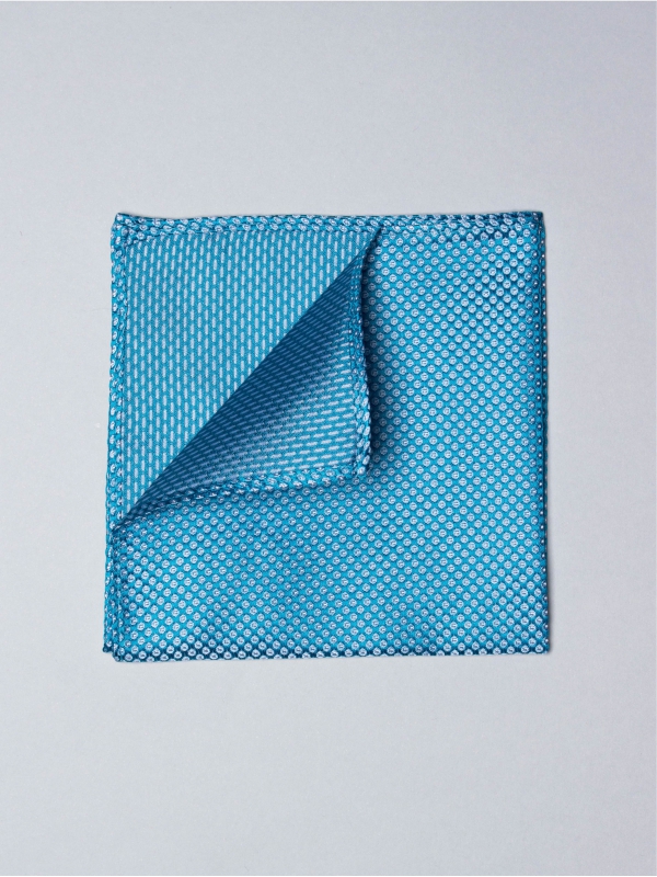 Pochette bleu turquoise avec des fines pastilles 