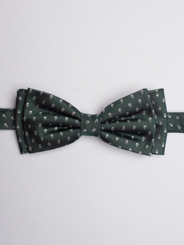 Green bow tie with skulls patterns