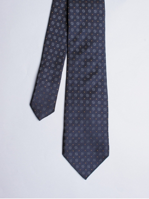 Cravate bleue avec motifs cercles