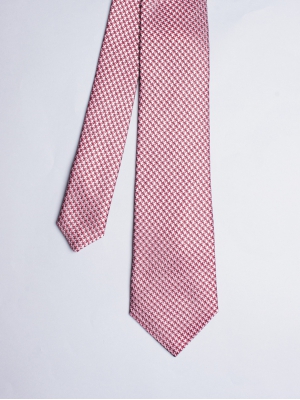 Cravate tissée rose à motifs géométriques