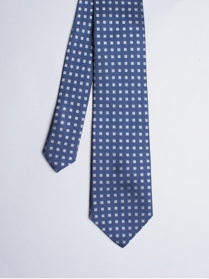 Cravate bleu marine avec motifs carrés