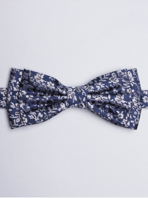Blue bow tie with floral patterns