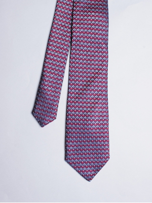 Cravate avec motifs tissés bleus et rouges