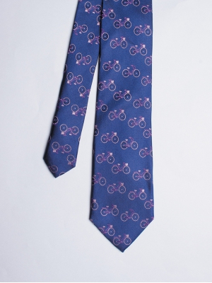 Cravate bleu marine avec motifs vélos violets