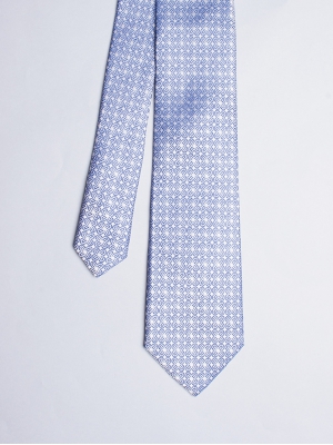 Cravate bleue avec motifs rosaces