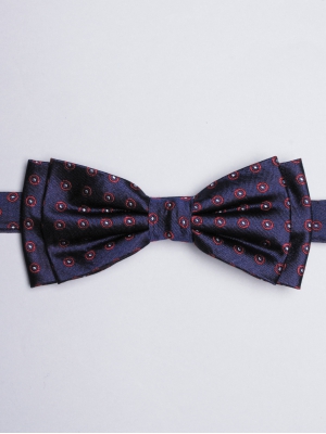 Blue bow tie with red circle patterns