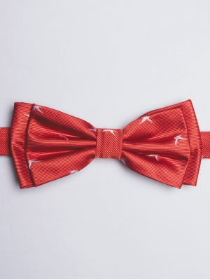 Bright red bow tie with sea bird patterns