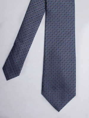 Cravate bleue à motifs micro-carrés