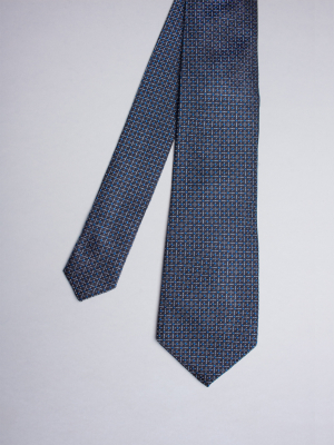 Blue tie with labyrinth pattern