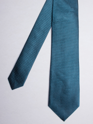 Peacock blue tie with patterns