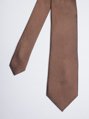 Ochre tie with triangle patterns