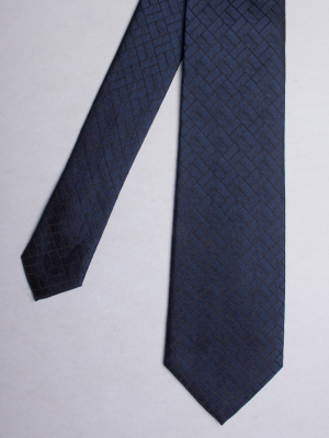 Cravate bleu foncé à motifs rectangles