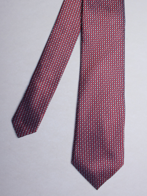 Red tie with tricolor patterns