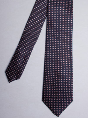 Cravate bleu nuit à motifs carrés roses