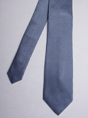 Blue tie with hexagons patterns