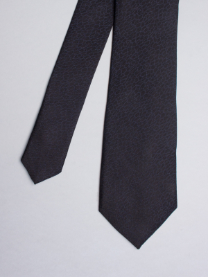 Cravate noire à motifs écailles