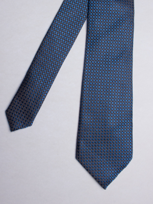 Blue tie with rounds patterns