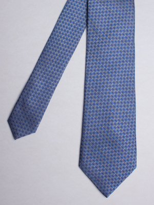 Blue tie with rings patterns