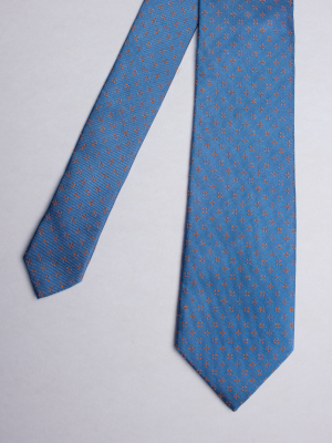 Blue tie with orange stars patterns