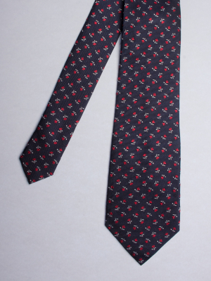 Night blue tie with red flowers patterns
