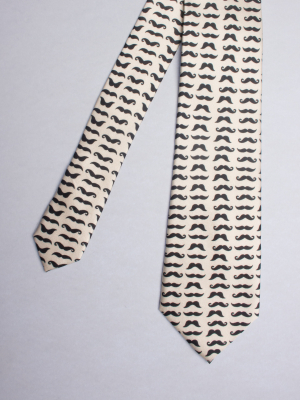 Ivory tie with black moustache prints