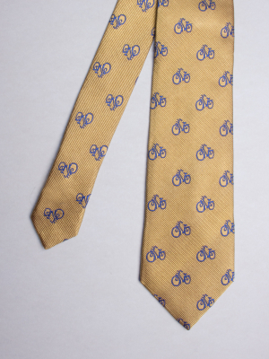 Yellow tie with blue bicycles patterns