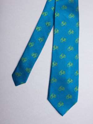 Blue tie with green bicycles patterns