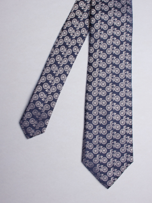 Night blue tie with white bicycles patterns
