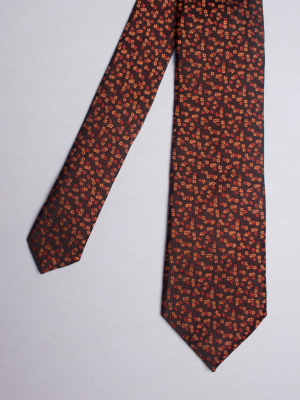 Cravate marron à motifs fleurs orangées