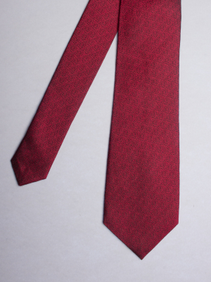 Red tie with roses patterns