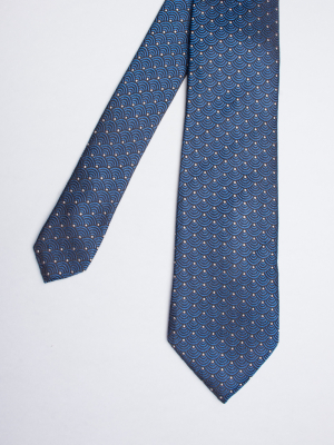Blue tie with geometric waves patterns