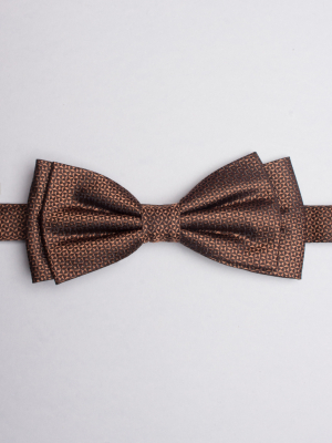 Ochre bow tie with triangle patterns
