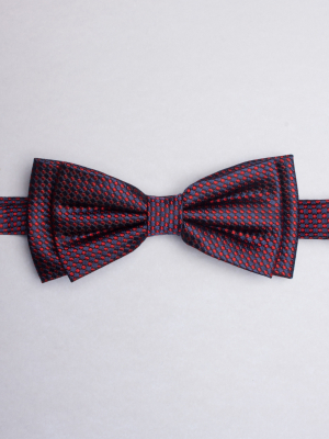 Blue bow tie with red dots patterns