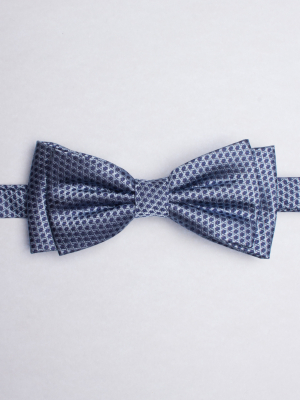 Blue bow tie with hexagon patterns