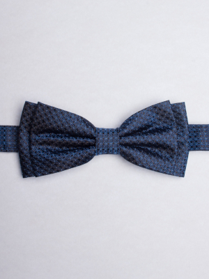Blue bow tie with black flowers patterns