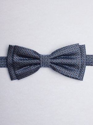 Blue bow tie with oval patterns