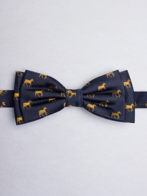 Blue bow tie with yellow horses patterns