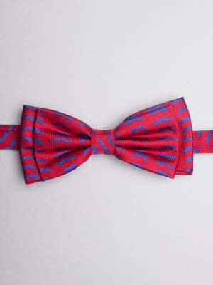 Red bow tie with blue moustache patterns