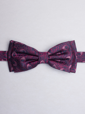 Blue bow tie with fuchsia peacock feathers patterns