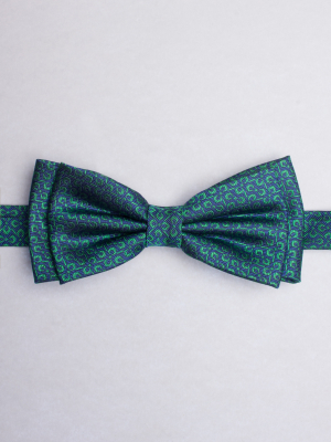 Blue bow tie with green propellers patterns