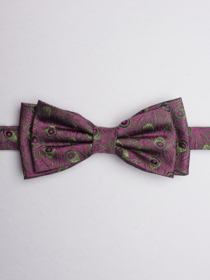 Purple bow tie with peacock feathers patterns