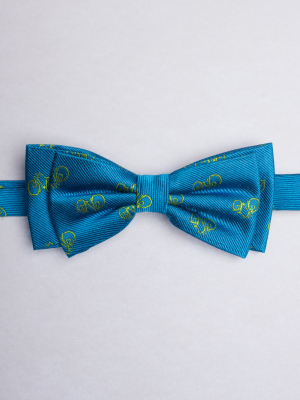 Blue bow tie with green bicycles patterns