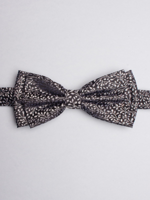 Black bow tie with silver floral pattern