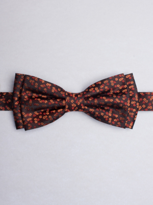 Brown bow tie with orange flowers patterns
