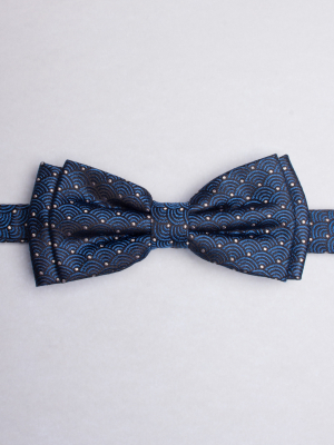 Blue bow tie with geometric waves patterns