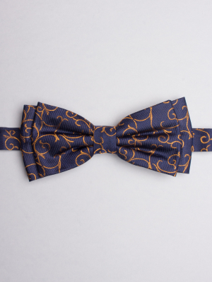 Blue bow tie with yellow arabesques patterns