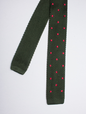 Dark green knitted silk tie with red dots